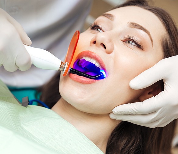 Patient receiving cosmetic dental bonding